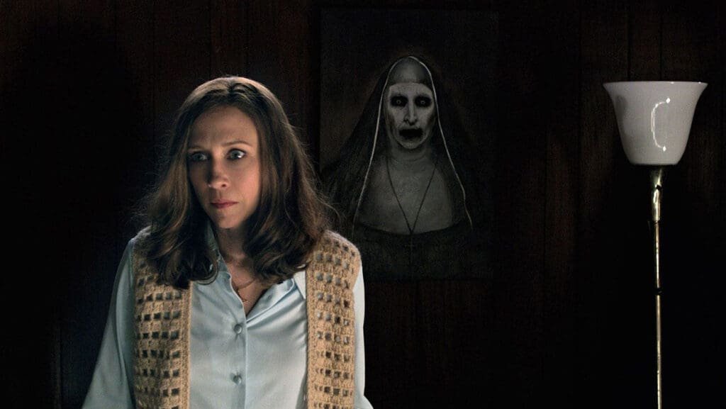 A shot from the horror thriller, The Conjuring, featuring the Nun and Loraine Warren.