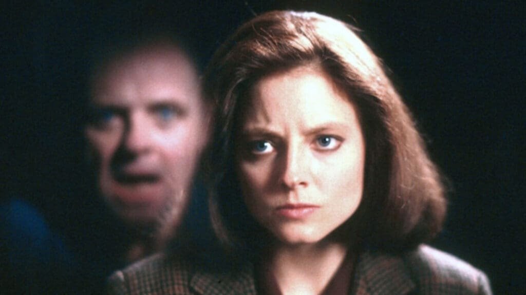 A shot from the iconic thriller, Silence Of The Lambs featuring Jodi Foster and Anthony Hopkins.